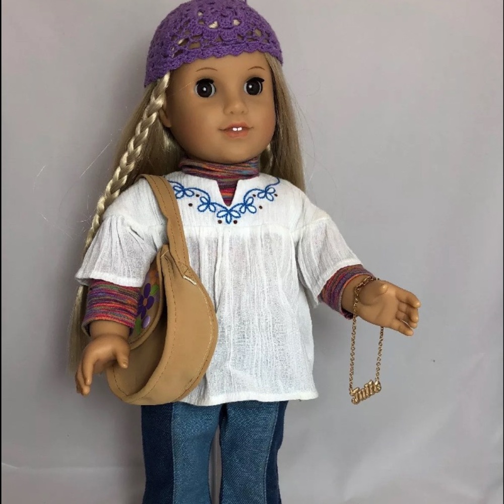 American Girl Doll Julie Albright. Gently used and has original items as shown